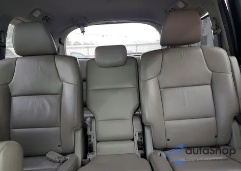 2012 Honda Odyssey Touring z USA, uszkodzony, nr VIN 5FNRL5H9XCB043913